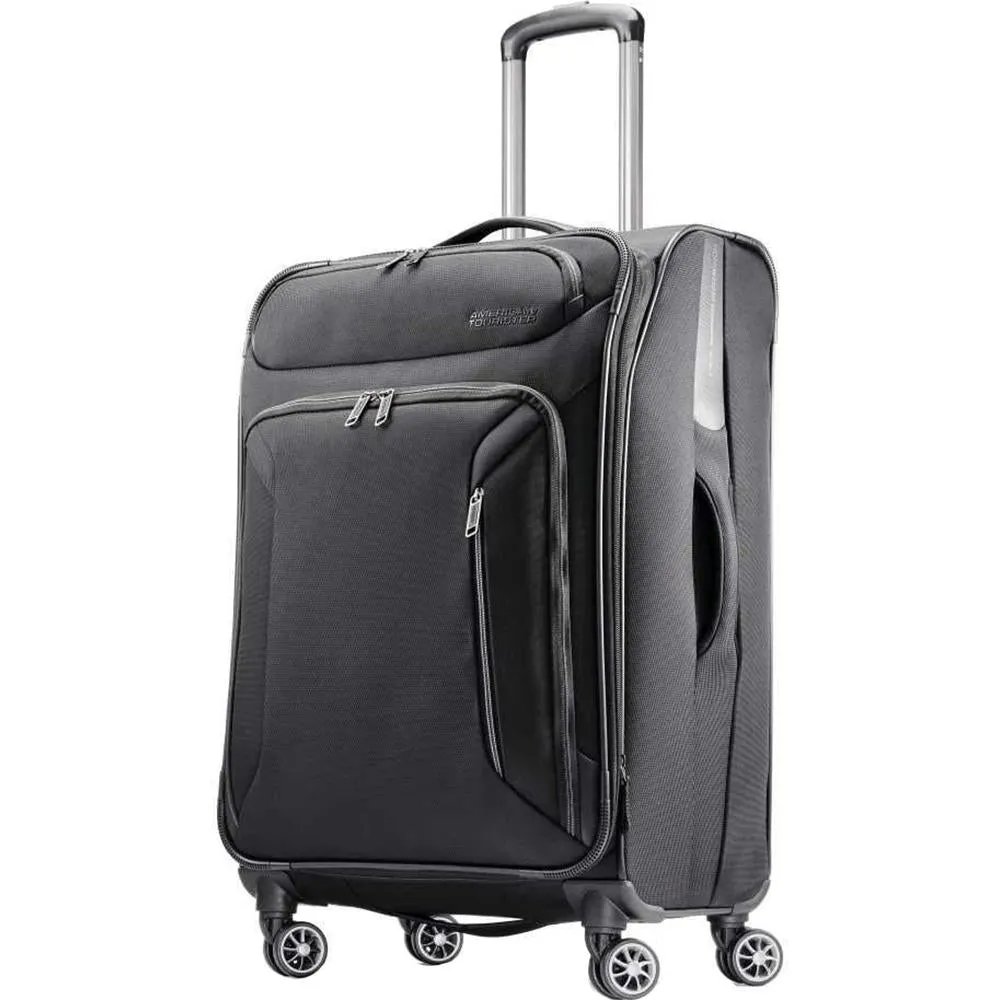 American Tourister 25" Zoom Spinner Expandable Luggage Black Pillow & Headphones
